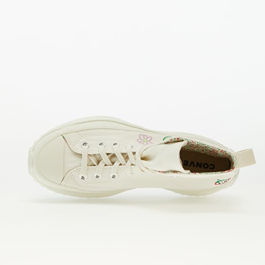 White converse shop with pink stripe