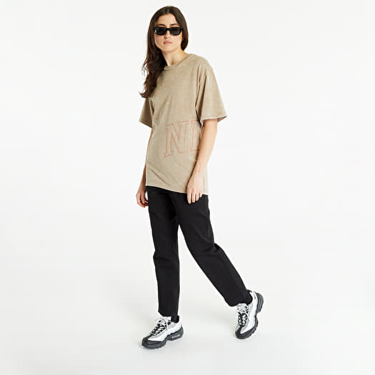 tan and black nike shirt