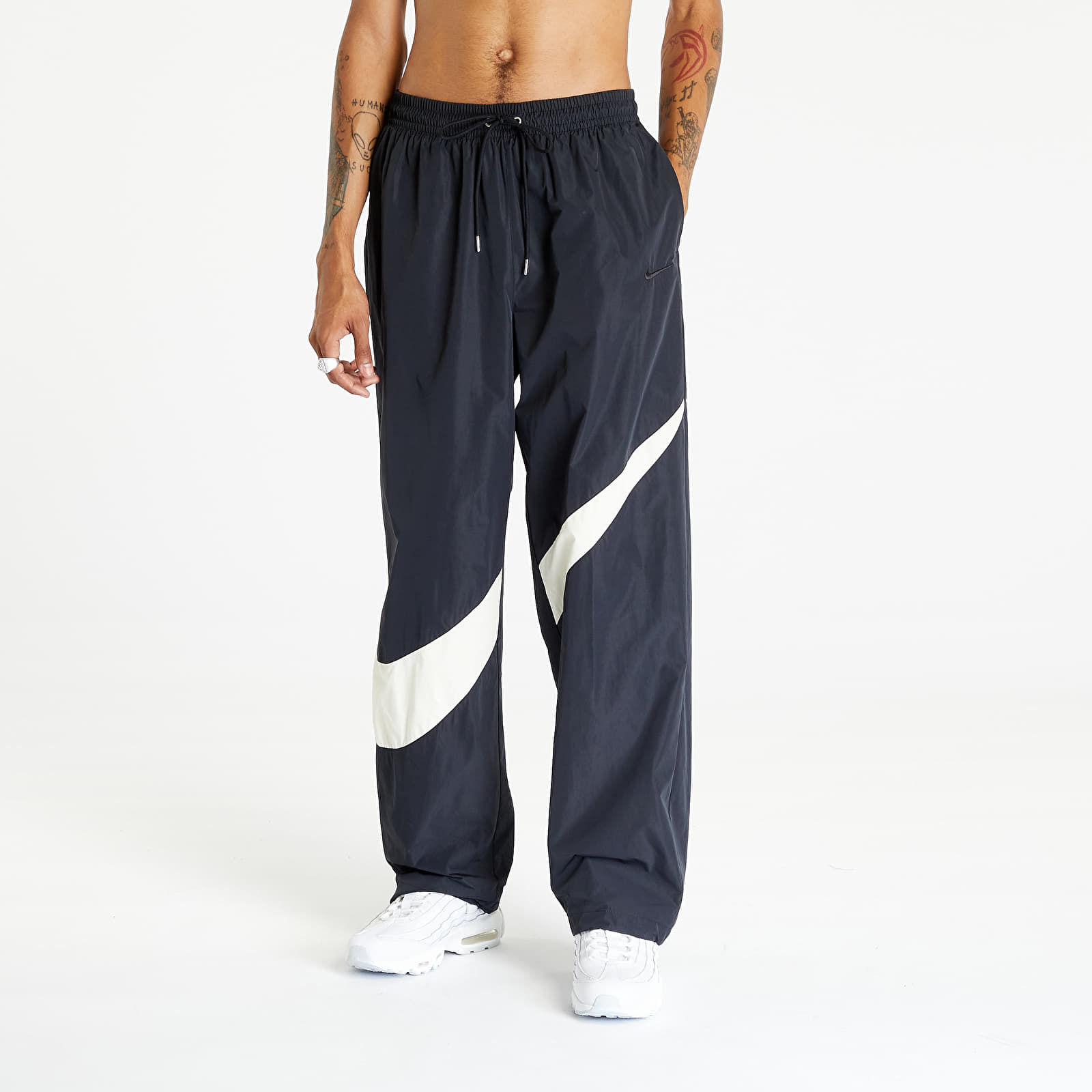 Levně Nike Swoosh Men's Woven Pants Black/ Coconut Milk/ Black