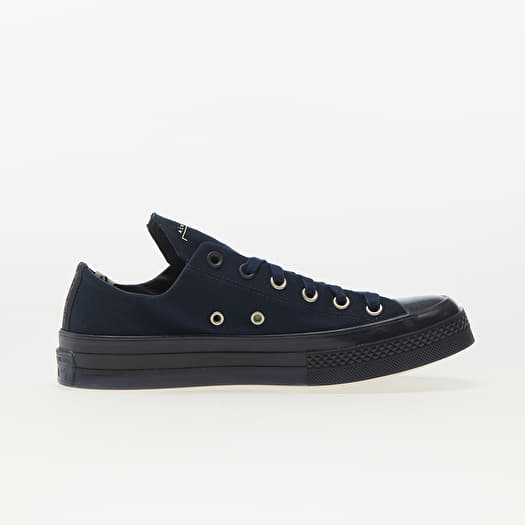 Navy leather converse deals