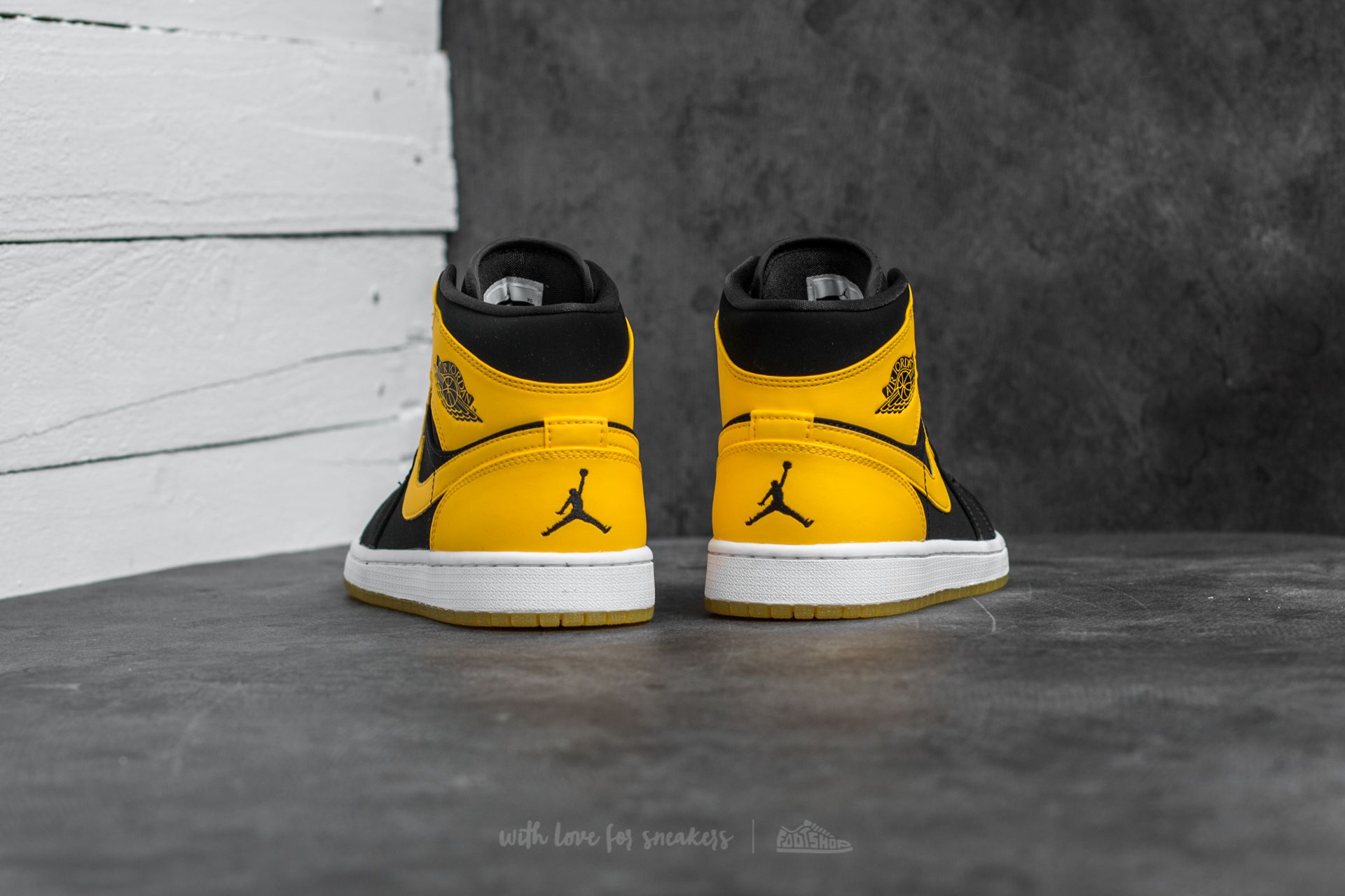 Scarpe uomo Air Jordan 1 Mid Black/ Varsity Maize-White