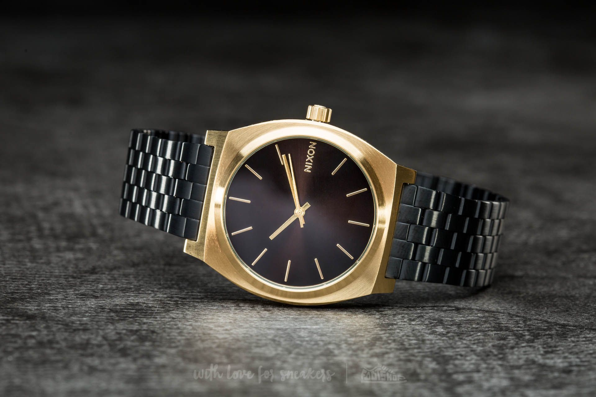 Nixon time teller gold black online