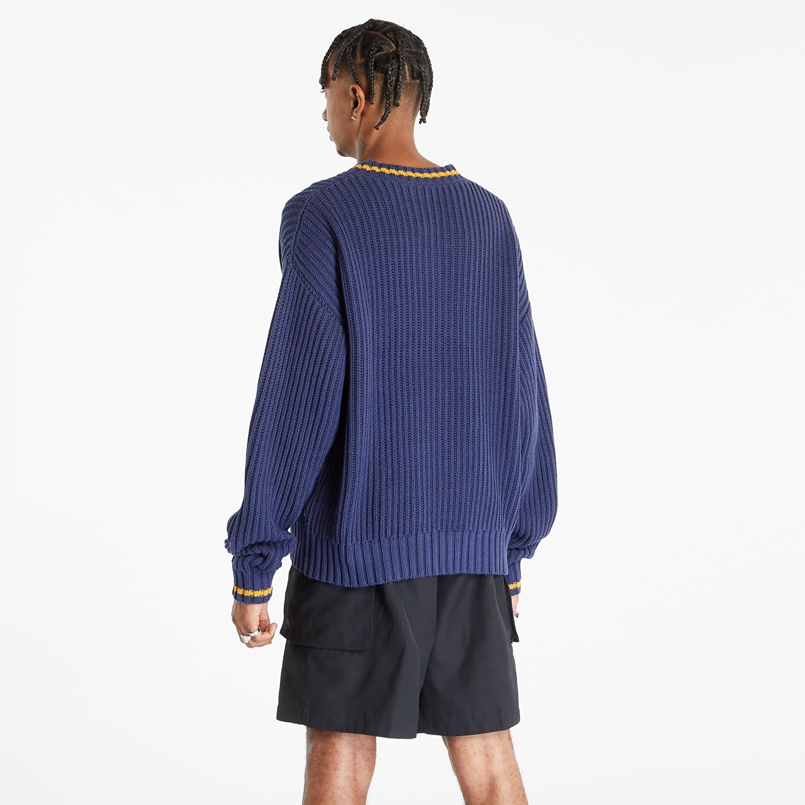 Champion sweater material sales crossword