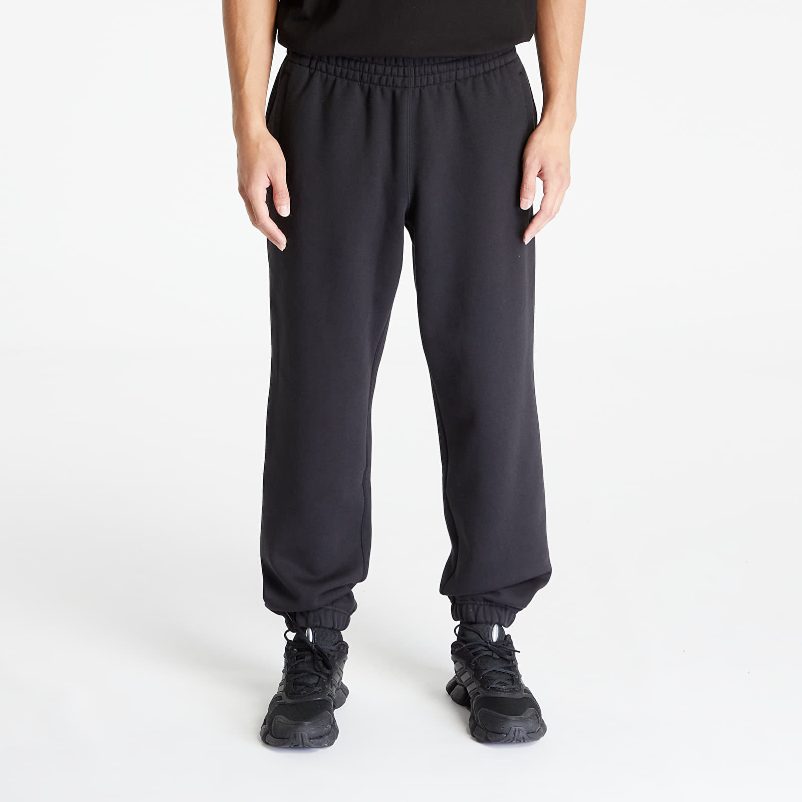 Adidas originals premium skinny joggers in black dn69 top