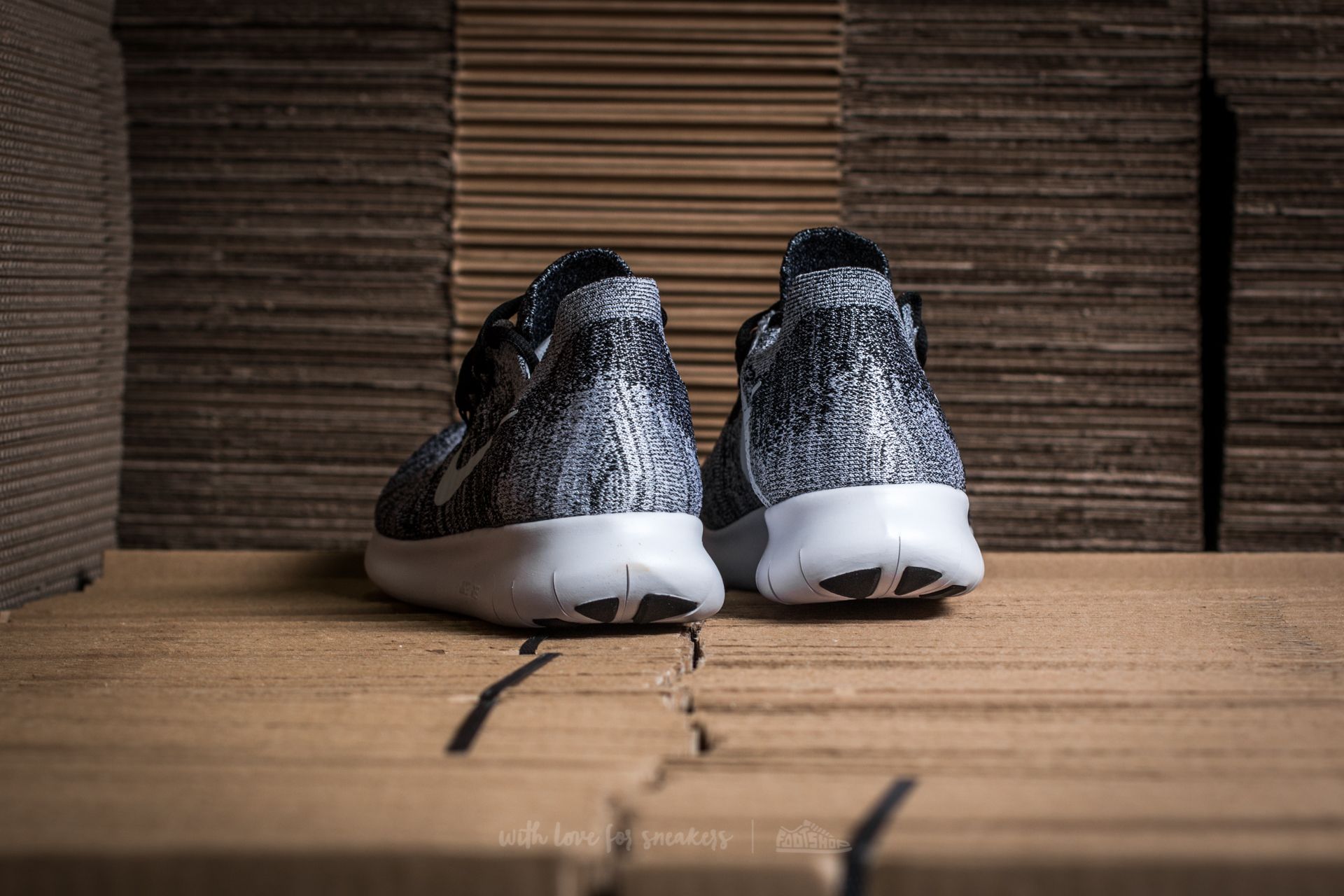 Nike free rn flyknit 2017 women's sales black and white