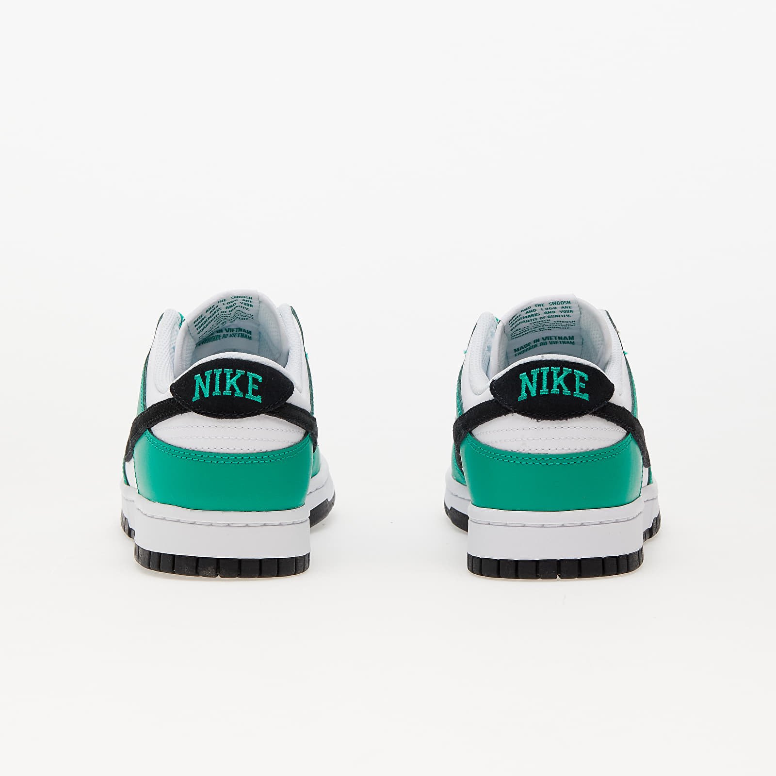 Green black and white nikes shop